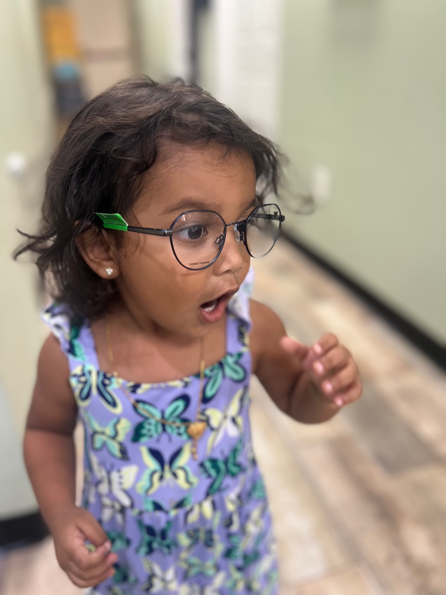 Child trying on frames